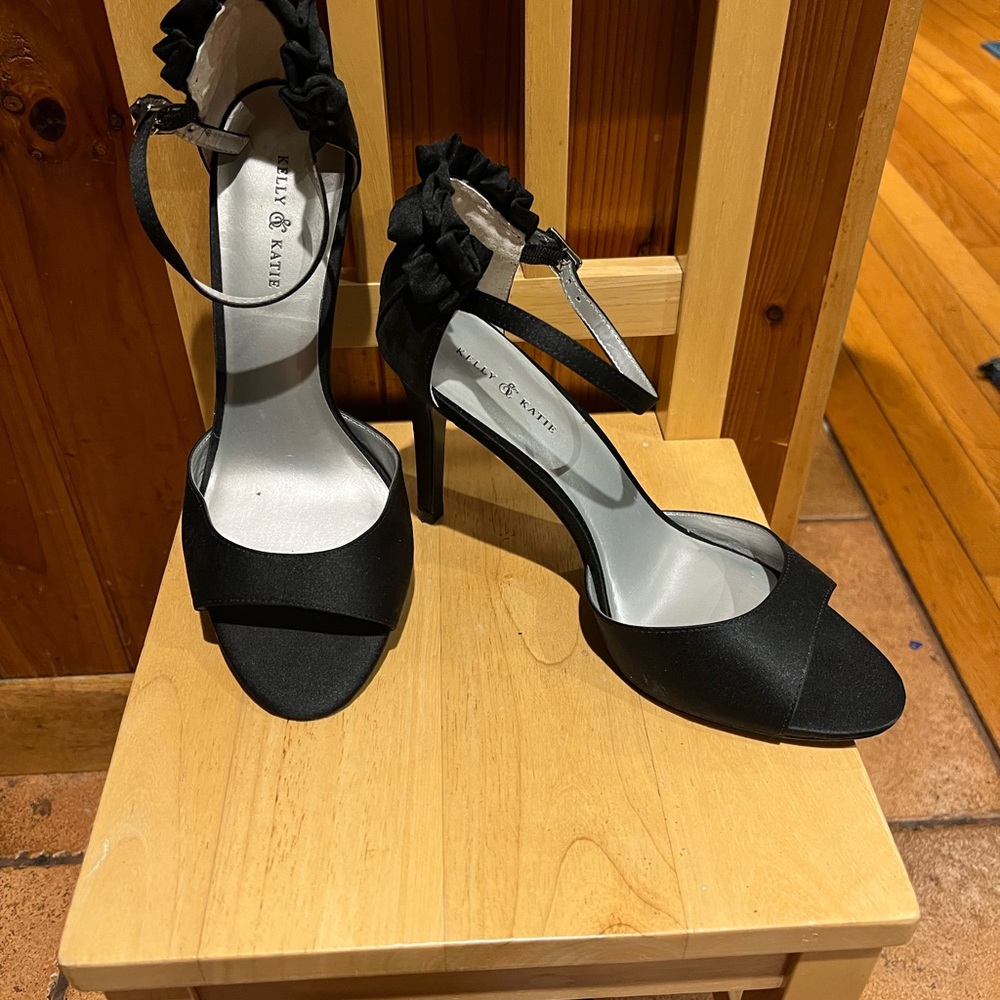Beautiful black satin shoes with elegant details